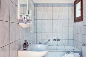 Kylpyhuone majoituspaikassa Leda Village Resort