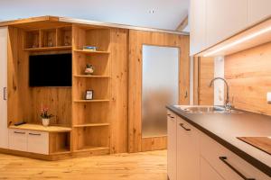 Kuchyň nebo kuchyňský kout v ubytování Luisl Hof - Apartment Herbae