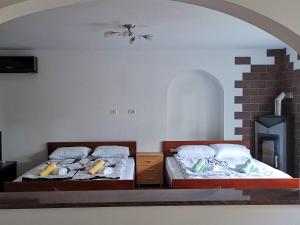 Postel nebo postele na pokoji v ubytování APARTMA VATOVEC