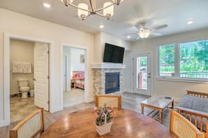 a living room with a table and a fireplace at 7 Mi to Arapahoe Basin Ski Area Keystone Condo in Keystone