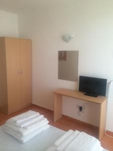 TV a/nebo společenská místnost v ubytování Guest Rooms Venera