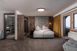 Posteľ alebo postele v izbe v ubytovaní Hotel Das Kohlmais