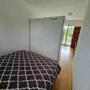 Postel nebo postele na pokoji v ubytování Comfy Plaza