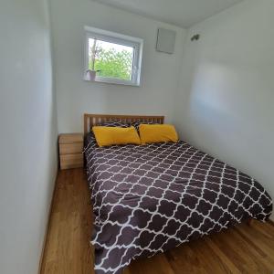 Postel nebo postele na pokoji v ubytování Comfy Plaza