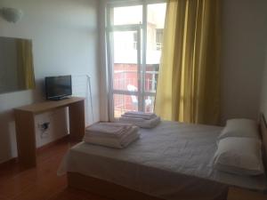 Postel nebo postele na pokoji v ubytování Guest Rooms Venera