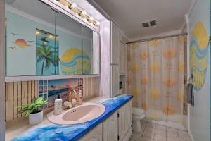a bathroom with a sink and a shower at Coastal Edgewater Home with Private Hot Tub! in Annapolis +35 photos
