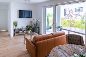 Μια τηλεόραση ή/και κέντρο ψυχαγωγίας στο Zweite Heimat Apartment 2