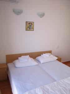 Postel nebo postele na pokoji v ubytování Guest Rooms Venera