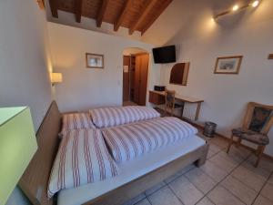 TV a/nebo společenská místnost v ubytování Hotel Astoria