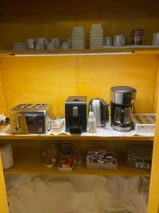 Coffee and tea making facilities at LA FINESTRA SUL BORGO Dimora Storica