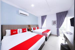 Beryll Inn Cyberjaya Hotel客房内的一张或多张床位