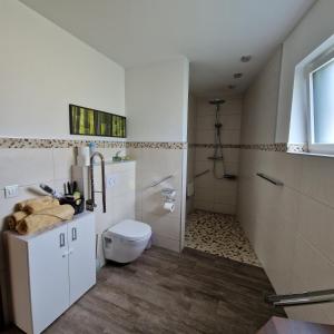 Koupelna v ubytování Comfy Plaza