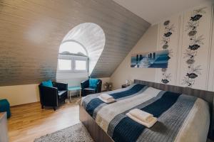 Posteľ alebo postele v izbe v ubytovaní Villa JKC