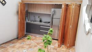 Hermosa Suite Privada en Casa Holística tesisinde mutfak veya mini mutfak