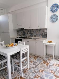 Η κουζίνα ή μικρή κουζίνα στο Villa Porto delle Genti