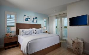 Voodi või voodid majutusasutuse The Pointe Hotel toas