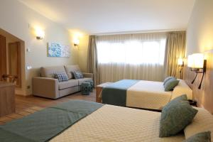 Katil atau katil-katil dalam bilik di Hotel & Spa Real Villa Anayet