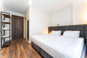 Letto o letti in una camera di Hotel Chatini Mestia