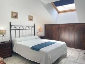 Postel nebo postele na pokoji v ubytování Hotel Al-Andalus