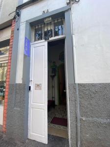 an open door of a building with a door sidx sidx at Tenerife Art Hostel in Santa Cruz de Tenerife