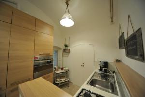 Kuchyň nebo kuchyňský kout v ubytování Zuppetta16 Apartments