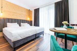 Letto o letti in una camera di Hotel Chatini Mestia