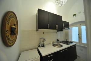 Kuchyň nebo kuchyňský kout v ubytování Zuppetta16 Apartments