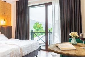 Letto o letti in una camera di Hotel Chatini Mestia