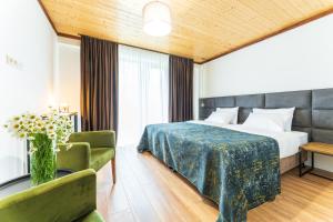 Letto o letti in una camera di Hotel Chatini Mestia