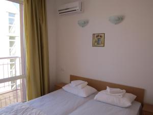 Postel nebo postele na pokoji v ubytování Guest Rooms Venera