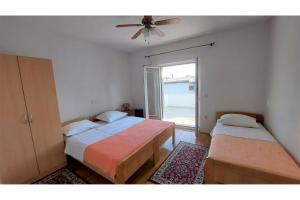 Postel nebo postele na pokoji v ubytování Apartments & Room Masa