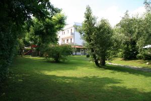 A garden outside Hotel La Bussola