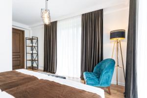Letto o letti in una camera di Hotel Chatini Mestia
