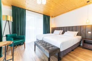 Letto o letti in una camera di Hotel Chatini Mestia