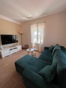 TV a/nebo společenská místnost v ubytování Holiday Home Calma