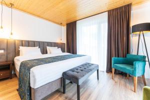 Letto o letti in una camera di Hotel Chatini Mestia