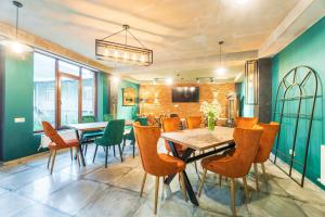 Posezení v ubytování Hotel Chatini Mestia