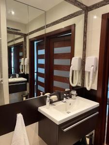 Kúpeľňa v ubytovaní Neptun Park Apartament - 100 m od plaży + 20 fotografií