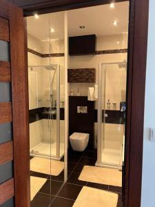Kúpeľňa v ubytovaní Neptun Park Apartament - 100 m od plaży