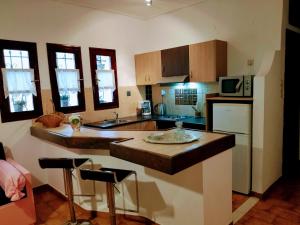Kuchyňa alebo kuchynka v ubytovaní Ostria Apartments Kalives