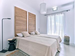 Tempat tidur dalam kamar di Calliope house