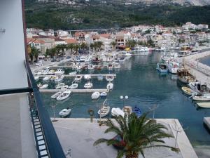 a view of a marina with boats in the water at Apartments Waterfront IVAN 2 in Podgora