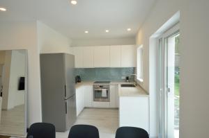 Kuchyň nebo kuchyňský kout v ubytování Sz36 Apartman + 2 fotografie