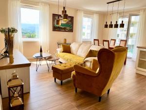 Posedenie v ubytovaní Apartament Cobena