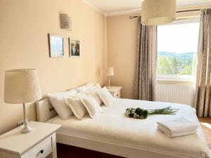 Posteľ alebo postele v izbe v ubytovaní Apartament Cobena
