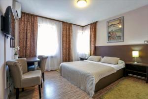 Кровать или кровати в номере Hotel Divan