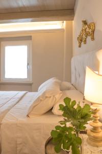 Ένα ή περισσότερα κρεβάτια σε δωμάτιο στο San Michele al Castello