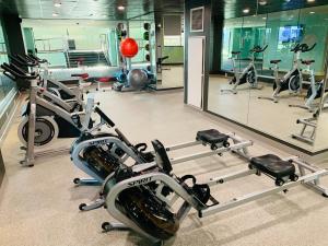 a gym with several treadmills and exercise bikes at Downtown Grand Hotel & Casino in Las Vegas