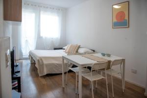 Posteľ alebo postele v izbe v ubytovaní Appartamenti Scrovegni