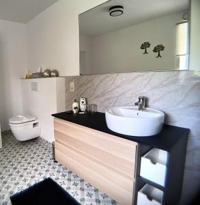 Koupelna v ubytování B&B l'Aigrin